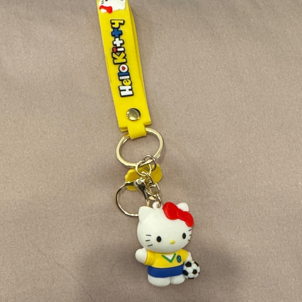 Hello Kitty Soccer Doll Keychain with Yellow Strap